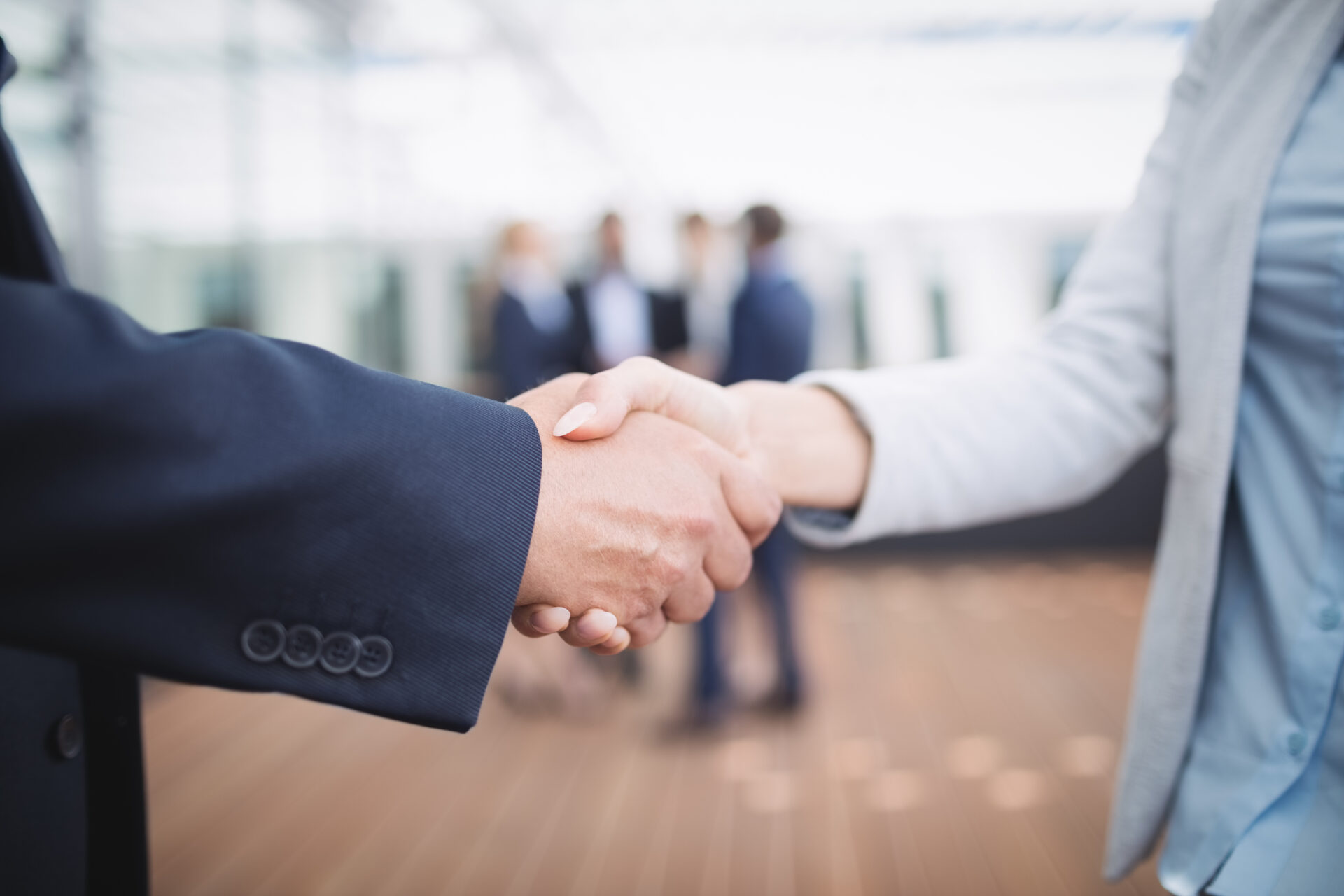 Close up of businesspeople shaking hands